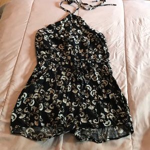 Black romper with tan pattern
